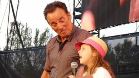 Bruce Springsteen with Grace Lynch in 2013