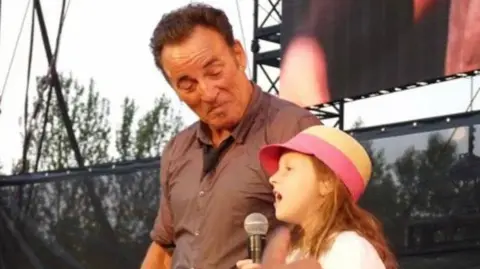 Gary Lynch Bruce Springsteen with Grace Lynch in 2013