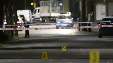 PA Media Police cordon off part of Rushmore Road in Clapton, Hackney, east London with crime scene tape as the Metropolitan Police launch an investigation into a murder.