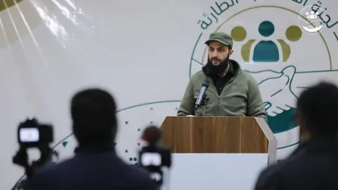 Salvation Government Abu Mohammed al-Jawlani taking questions at a press conference following the February 2023 earthquakes in northern Syria