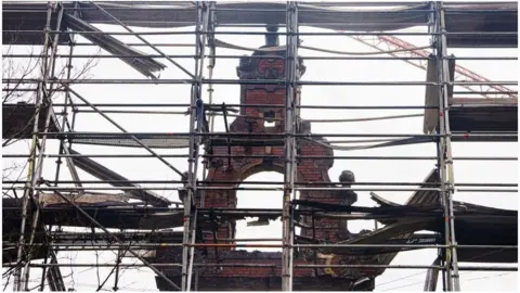 Getty Images The historic Borsen Stock Exchange one day after a fire ravaged the building and its iconic spire in Copenhagen on April 17, 2024.