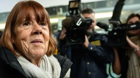 Gisèle Pelicot, 72, stands outside the court in Avignon ahead of the verdicts of 51 men accused in a mass rape trial