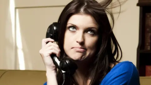 Getty Images Woman on the phone