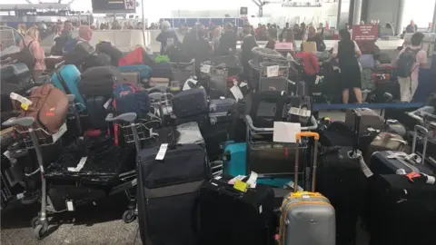 Will Carson Baggage and assengers at Stansted