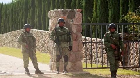 Reuters Soldiers keep watch outside the properties of Mexican-American Mormons that were killed in Bavispe, in La Mora, Sonora state, Mexico November 6, 2019