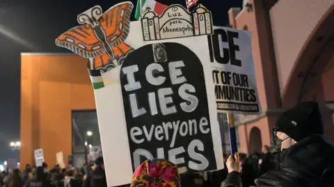 Anadolu via Getty Images A sign that reads 'ice lies everyone dies'. 