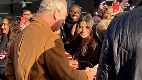 Sean Coughlan/BBC News King Charles greeting crowds in Luton