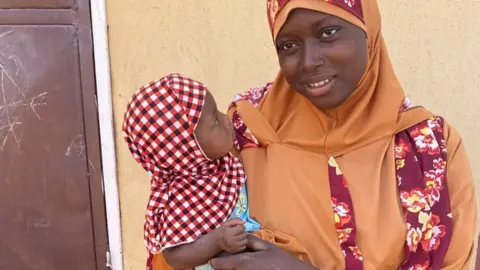 HDI Woman with a child