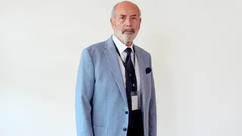 Reform UK Reform UK leader Dan Harrison in a blue jacket