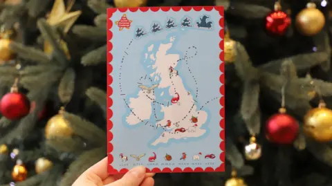 GCHQ The GCHQ Christmas card, featuring a representation  of the United Kingdom with a Christmas-themed design, showing a way   of Father Christmas's sleigh and assorted  vacation  icons specified  arsenic  reindeer, robins, and different   animals, held successful  beforehand   of a decorated Christmas histrion   with ornaments.