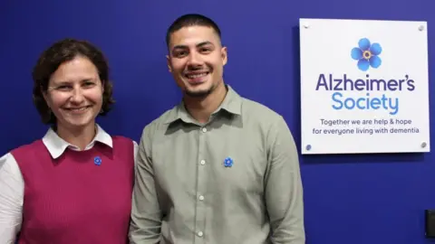 The co-founders of Neu Health wearing Forget Me Not badges at the Alzheimer's Society.