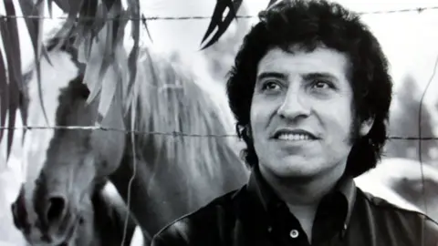Reuters Chilean singer Victor Jara, who was tortured and died during the military dictatorship of [General Augusto Pinochet], is seen in this undated file picture.