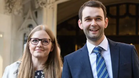 Getty Images/Leon Neal Amy and Daniel McArthur after their UK Supreme Court victory in 2018