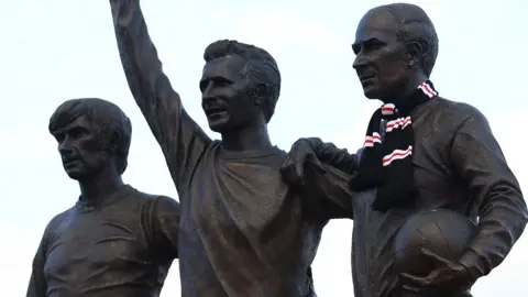 Reuters The statue of the United Trinity at Old Trafford - George Best, Denis Law and Bobby Charlton