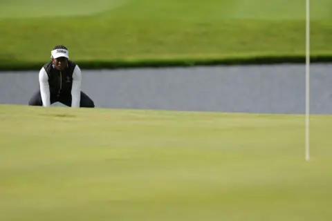 DYLAN BUELL/GETTY IMAGES  Georgia Oboh of Nigeria lines up a putt on the fifth green during the final round of the Dow Championship at Midland Country Club on 30 June in Midland, Michigan.