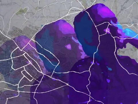 Clare Williams A piece of art showing the silhouettes of a person over a map