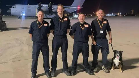 LFRS Darren Burchnall, Ben Clarke, Karl Keuneke, Neil Woodmansey and rescue dog Colin