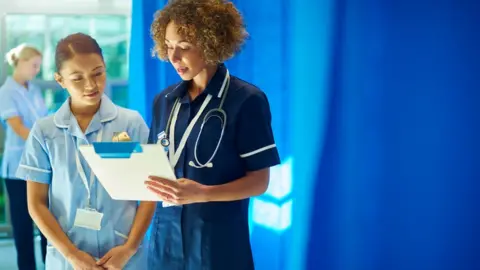 Getty Images Nurses on ward