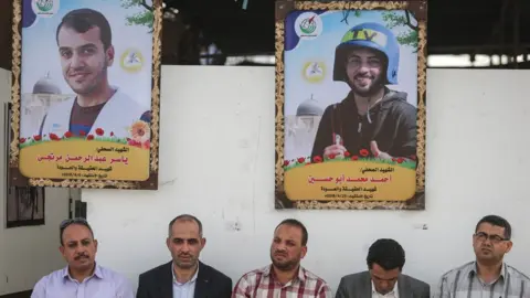 Anadolu Agency Posters showing Ahmed Abu Hussein (Top R) and Yaser Murtaja (Top L) at an exhibition organised by Palestinian journalists in Gaza City (2 May 2018)