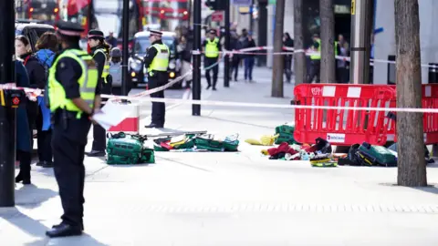 PA Media Police have cordoned off parts of Bishopsgate