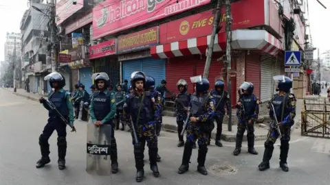 AFP Bangladesh police stand guard in Dhaka following a verdict in the corruption case of Bangladesh"s main opposition leader and Bangladesh Nationalist Party chairperson Khaleda Zia in Dhaka on February 8, 2018.