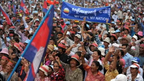 AFP Supporters of the opposition Cambodia National Rescue Party (CNRP) shout slogans during a demonstration in Phnom Penh on December 16, 2013