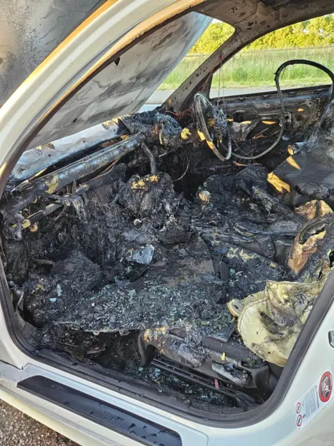 Cambridgeshire Fire and Rescue Service Interior of burnt-out car