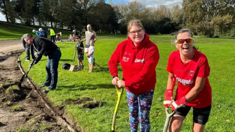 BBC Volunteers unearth the athletic track at Temple Newsam