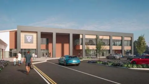 Shropshire Council/Roberts Limbrick A 3D virtual image of what the sports village could look like. A group of people are seen walking to the facility while a car drives up to the entrance. The building is at least two storeys with dark grey coloured pillars across the front. 