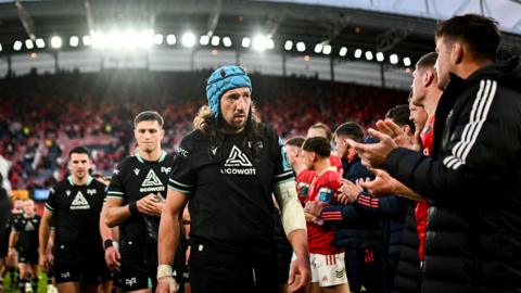 Justin Tipuric and Ospreys team-mates leave the Thomond Park pitch