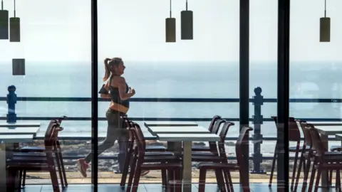 Getty Images A woman exercises in Porthcawl