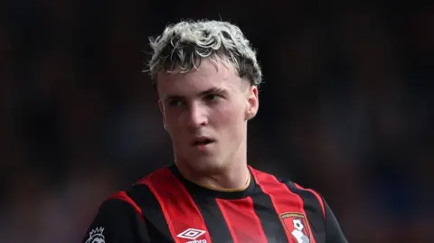 Alex Jimenez looks on during a Bournemouth match