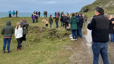 BBC People on the cliffs at Port Quin