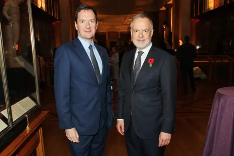 Getty Images British Museum's chairman, George Osborne (left) with Dr Hartwig Fischer (right) former director at the British Museum
Osborne in navy blue suit and pale blue shirt with Fischer in dark blue suit, white shirt and check tie
