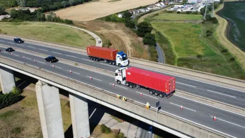 John Fairhall/BBC An aerial shot of the Orwell Bridge with vehicles travelling on it