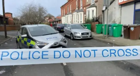Police vehicles pictured at Forster Street.
