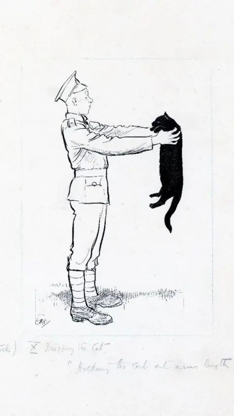 The Shepard Trust/University of Surrey Pen and ink drawing of a First World War soldier. His cap is pushed back on his head and he is holding a black cat by its shoulders at arms length. He and the cat are staring at each other.  