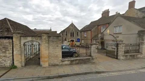 Google Exterior of St Adhelm's Church courtyard