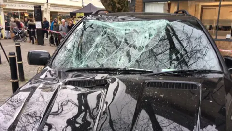 BBC Car with broken windscreen