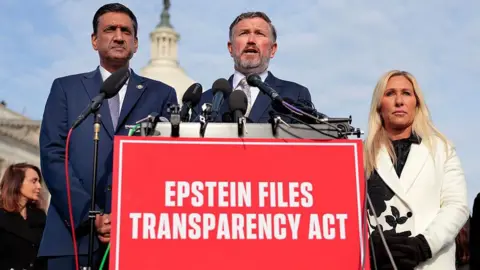 Getty Images Thomas Massie speaks alongside U.S. Rep. Ro Khanna and Marjorie Taylor Greene during a news conference on the Epstein Files Transparency Act 
