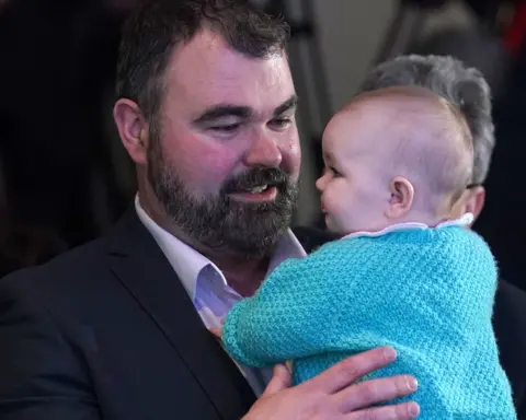 Ruaraidh White Ali MacLennan with baby Naomi