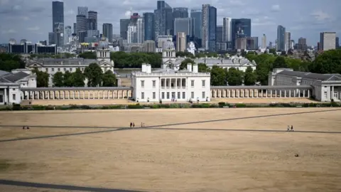 EPA Parks and fields in England are parched by the low rainfall