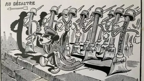 Lindah Kiddey, Armengol Estate This World War Two cartoon shows a 'Micky Mouse' type figure as Hitler, marching his troops towards disaster. They are shown as brushes with German helmets.
