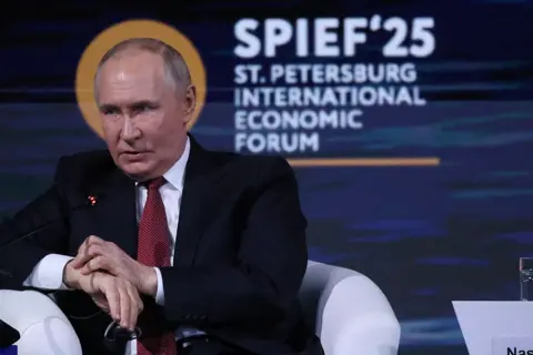 Russian President Vladimir Putin speaks during the plenary session of the 28th Saint Petersburg International Economic Forum SPIEF 2025