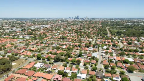 Getty Images Aerial shot of Perth city and its surrounding suburbs