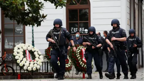 Reuters Police officers at site of wreath-laying ceremony in Vienna, Austria, 3 Nov, 2020