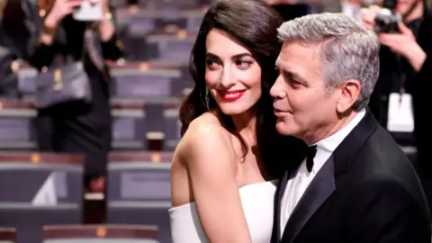 EPA Amal and George Clooney at Cesar awards ceremony