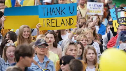 PA Media Ukrainians marching in Dublin