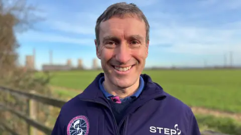 UK Fusion Energy CEO Paul Methven with the West Burton A site in the background