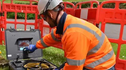 Openreach Engineer with equipment